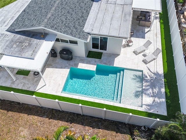 1990 NE 35th St, Lighthouse Point, FL 33064 - view of swimming pool with a fenced in pool, a fenced backyard, and a patio