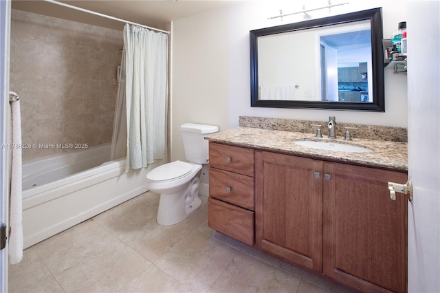 bathroom featuring shower / tub combo, toilet, vanity, and tile patterned floors