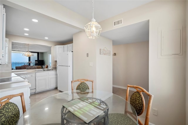 10000 S Ocean Dr Unit 703, Jensen Beach, FL 34957 - dining area with recessed lighting and baseboards
