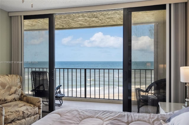 10000 S Ocean Dr Unit 703, Jensen Beach, FL 34957 - bedroom featuring view of water and beach