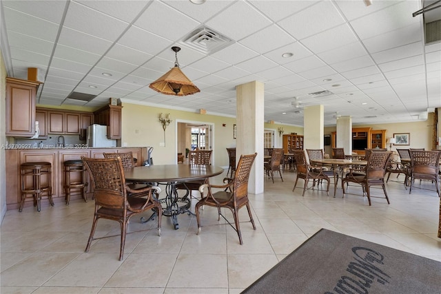10000 S Ocean Dr Unit 703, Jensen Beach, FL 34957 - dining area with light tile patterned flooring and a drop ceiling