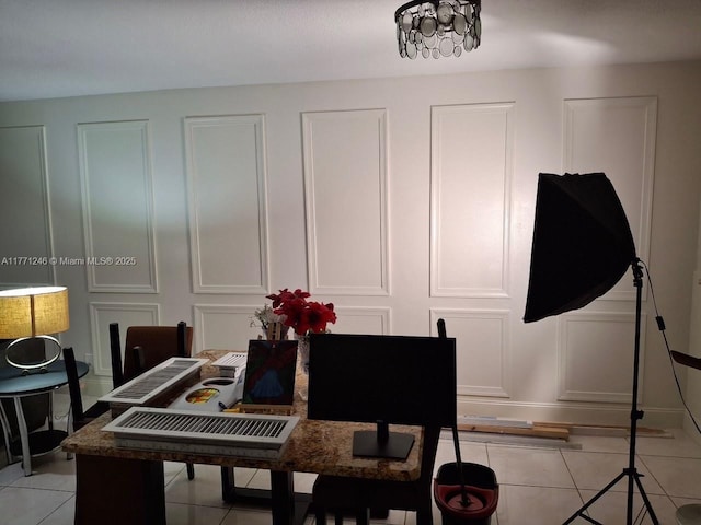 6101 N Falls Circle Dr Unit 312, Lauderhill, FL 33319 - dining room with light tile patterned floors and a decorative wall