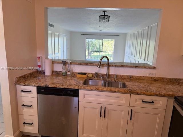 6101 N Falls Circle Dr Unit 312, Lauderhill, FL 33319 - kitchen with stainless steel dishwasher, stone counters, and white cabinets