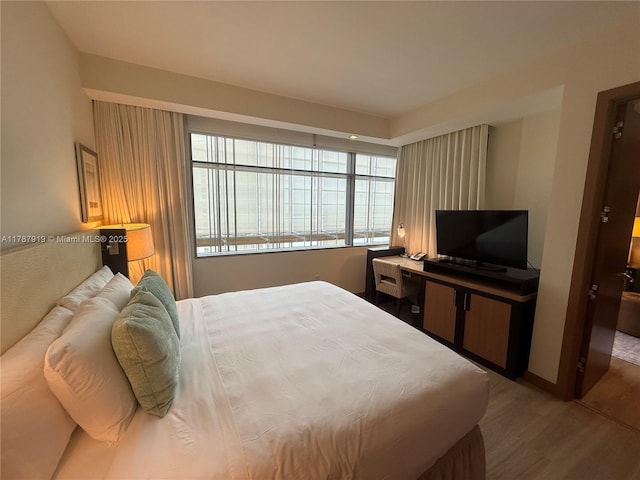 1395 Brickell Ave Unit 3211, Miami, FL 33131 - bedroom with wood finished floors