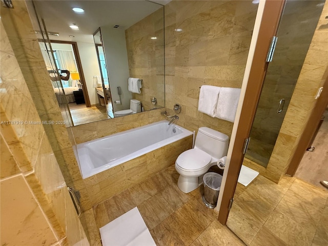 1395 Brickell Ave Unit 3211, Miami, FL 33131 - bathroom with tiled shower, a relaxing tiled tub, and tile walls