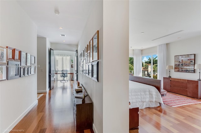 3835 Carole Ct, Miami, FL 33133 - corridor with recessed lighting, wood finished floors, visible vents, and baseboards