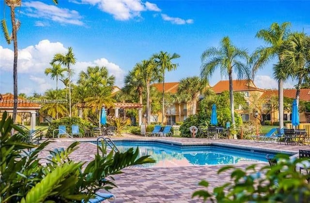 community pool with a patio