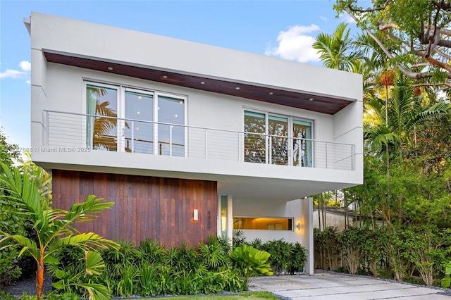 4039 Ventura Ave, Miami, FL 33133 - rear view of property with a balcony and stucco siding