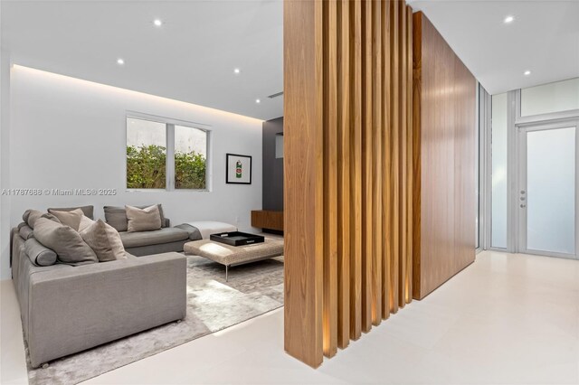 4039 Ventura Ave, Miami, FL 33133 - living area with an accent wall and recessed lighting