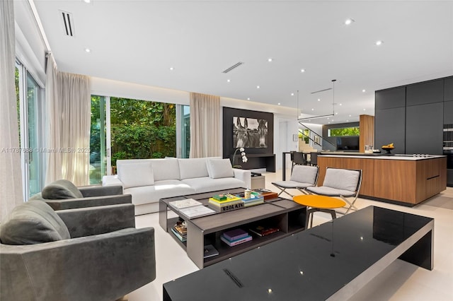 4039 Ventura Ave, Miami, FL 33133 - living area with a wealth of natural light and visible vents
