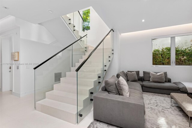 4039 Ventura Ave, Miami, FL 33133 - living area featuring visible vents and stairs