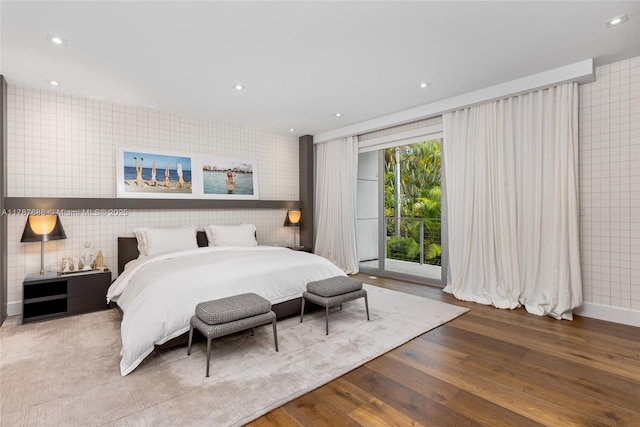 4039 Ventura Ave, Miami, FL 33133 - bedroom featuring wood finished floors, access to exterior, wallpapered walls, and recessed lighting