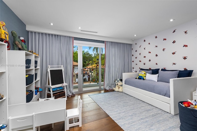 4039 Ventura Ave, Miami, FL 33133 - bedroom with visible vents, wood finished floors, recessed lighting, and access to exterior