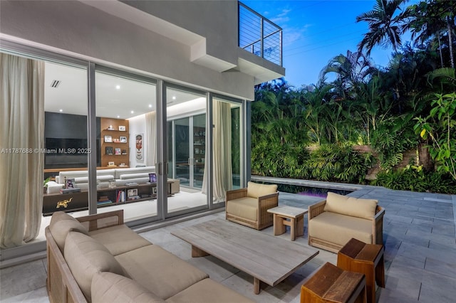4039 Ventura Ave, Miami, FL 33133 - view of patio featuring an outdoor hangout area, a balcony, and visible vents