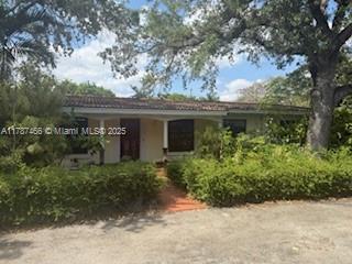 14275 SW 232nd St, Miami, FL 33170 - view of front facade featuring stucco siding