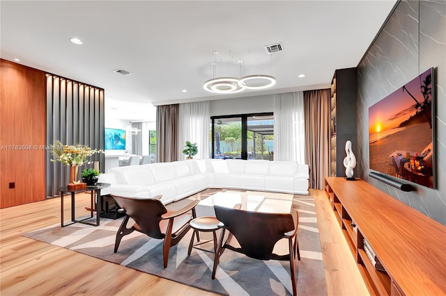 8608 Torrey Isles Ter, Boca Raton, FL 33496 - living area with light wood-style floors and recessed lighting