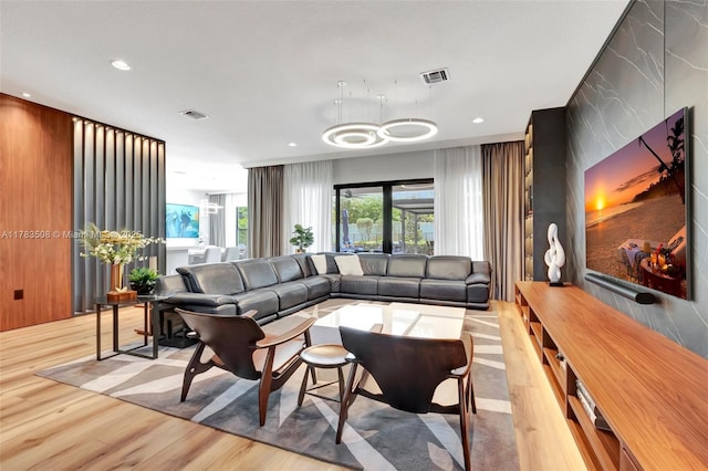 8608 Torrey Isles Ter, Boca Raton, FL 33496 - living area with light wood-style floors and recessed lighting