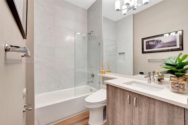 8608 Torrey Isles Ter, Boca Raton, FL 33496 - full bath with vanity,  shower combination, a chandelier, and wood finished floors