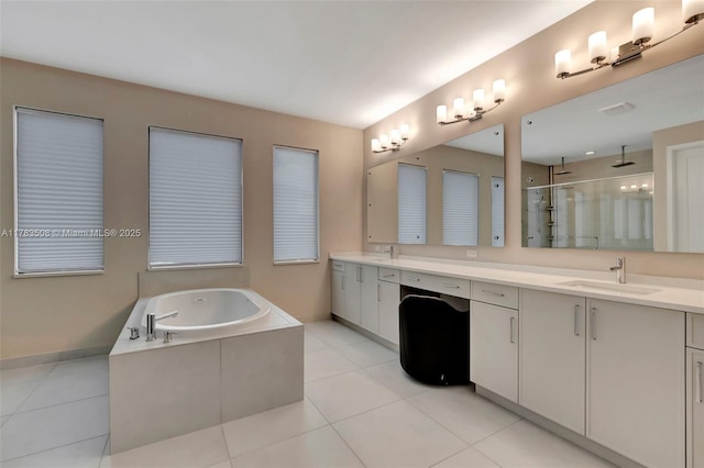 8608 Torrey Isles Ter, Boca Raton, FL 33496 - full bathroom with double vanity, a shower stall, a bath, and tile patterned flooring