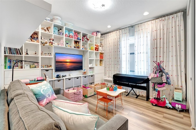 8608 Torrey Isles Ter, Boca Raton, FL 33496 - recreation room featuring wood finished floors and recessed lighting