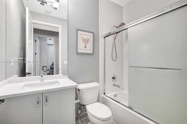 8608 Torrey Isles Ter, Boca Raton, FL 33496 - bathroom featuring vanity and bath / shower combo with glass door