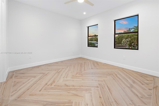 unfurnished room featuring a ceiling fan, baseboards, and recessed lighting