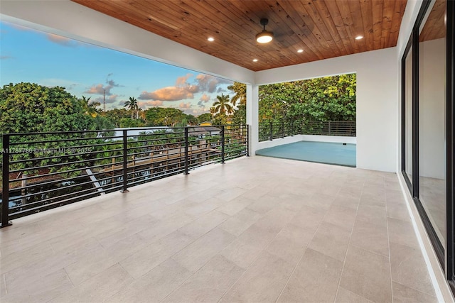 view of patio / terrace with a balcony