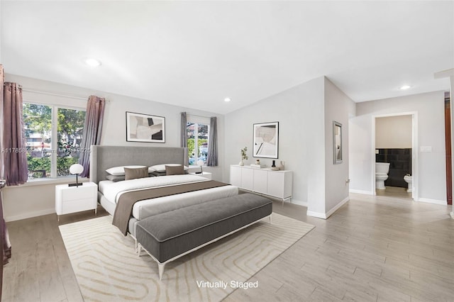 bedroom with recessed lighting, baseboards, vaulted ceiling, and light wood-type flooring