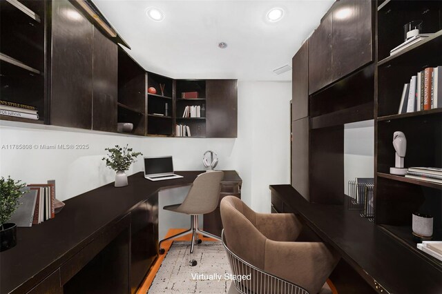 office with recessed lighting and built in study area