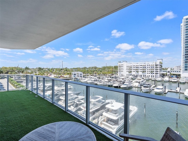 balcony featuring a water view