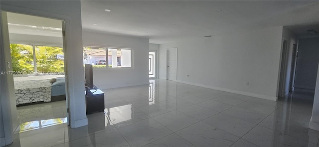 1531 SW 126th Pl, Miami, FL 33184 - empty room featuring baseboards and marble finish floor