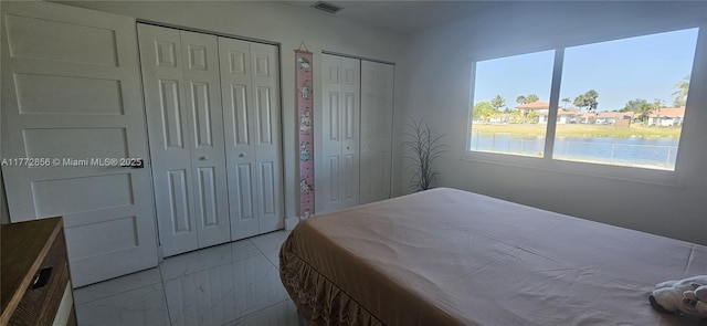 1531 SW 126th Pl, Miami, FL 33184 - bedroom featuring two closets and visible vents