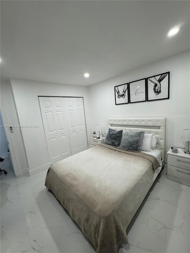 1531 SW 126th Pl, Miami, FL 33184 - bedroom featuring recessed lighting, marble finish floor, and a closet