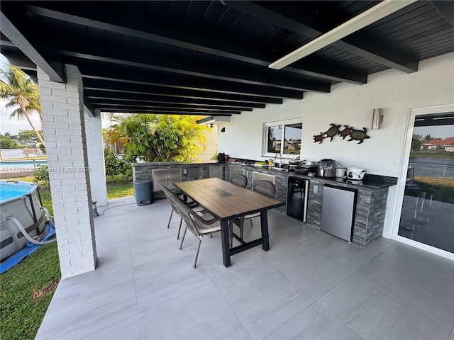 1531 SW 126th Pl, Miami, FL 33184 - view of patio with outdoor dining space, area for grilling, and an outdoor pool