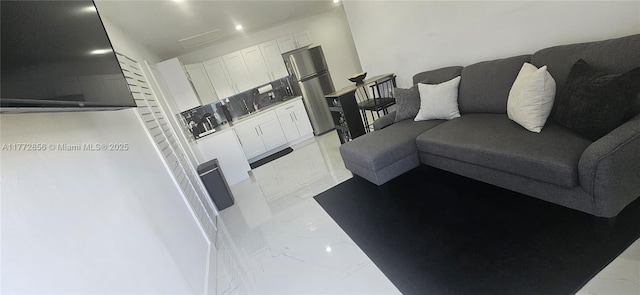1531 SW 126th Pl, Miami, FL 33184 - living room with recessed lighting and marble finish floor