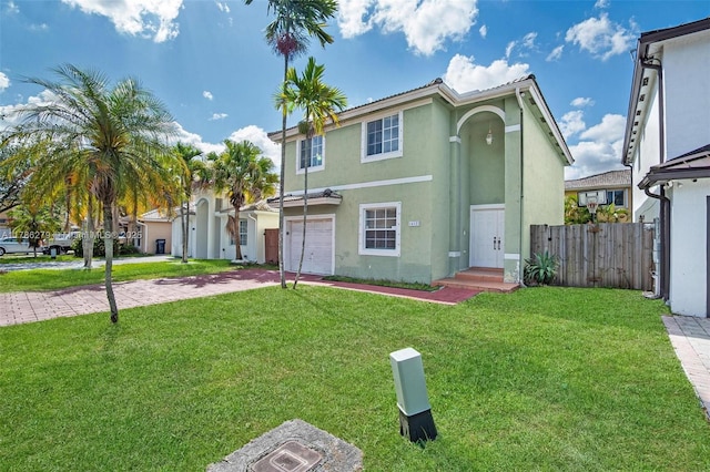 16122 SW 104th Ter, Miami, FL 33196 - traditional-style house with fence, driveway, a front lawn, and stucco siding