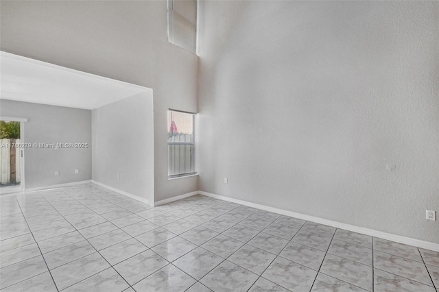 16122 SW 104th Ter, Miami, FL 33196 - spare room featuring baseboards
