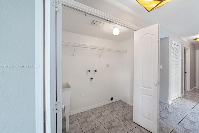 16122 SW 104th Ter, Miami, FL 33196 - laundry room featuring baseboards, laundry area, light tile patterned floors, and hookup for a washing machine