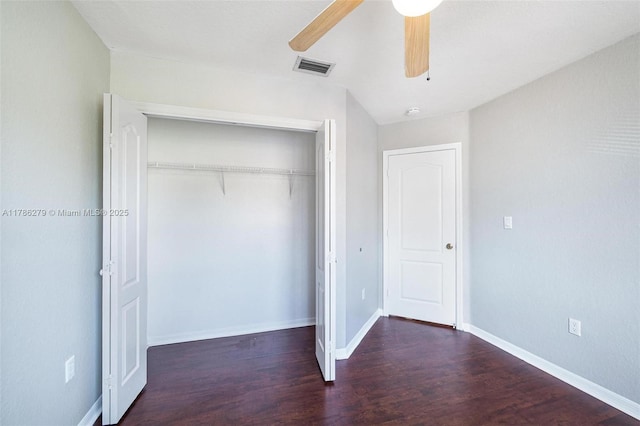 16122 SW 104th Ter, Miami, FL 33196 - unfurnished bedroom with wood finished floors, a closet, ceiling fan, baseboards, and visible vents