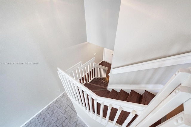 16122 SW 104th Ter, Miami, FL 33196 - staircase featuring baseboards