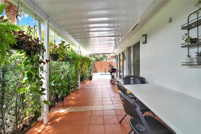 view of patio / terrace with fence and outdoor dining space