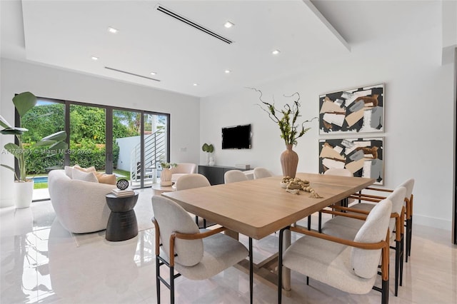 dining space with baseboards, visible vents, and recessed lighting