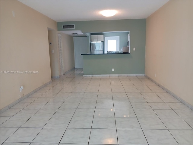 5950 Del Lago Cir Unit 112, Sunrise, FL 33313 - spare room featuring light tile patterned flooring