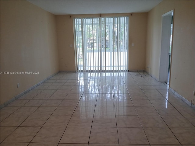 5950 Del Lago Cir Unit 112, Sunrise, FL 33313 - empty room with light tile patterned floors