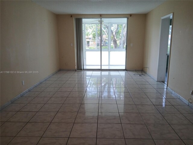 5950 Del Lago Cir Unit 112, Sunrise, FL 33313 - spare room with light tile patterned floors