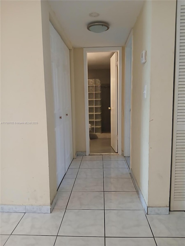 5950 Del Lago Cir Unit 112, Sunrise, FL 33313 - corridor with light tile patterned floors