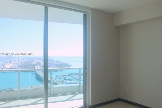 900 Biscayne Blvd Unit 3803, Miami, FL 33132 - empty room with a wealth of natural light, a water view, and a view of city