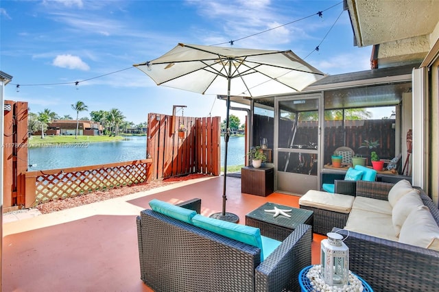 11914 SW 12th Ct, Davie, FL 33325 - view of patio with an outdoor living space, a water view, a sunroom, and fence