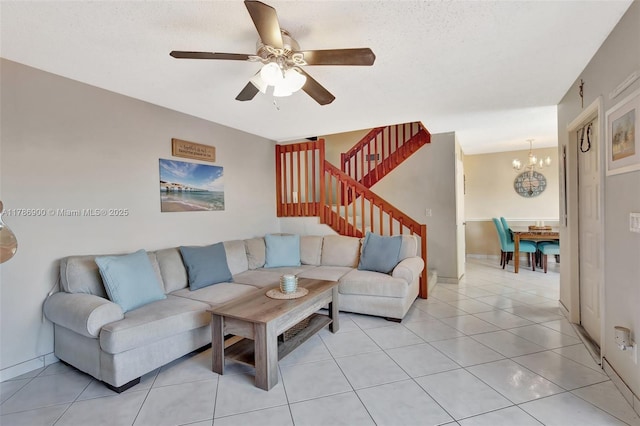 11914 SW 12th Ct, Davie, FL 33325 - living area with a chandelier, stairs, a ceiling fan, and light tile patterned flooring