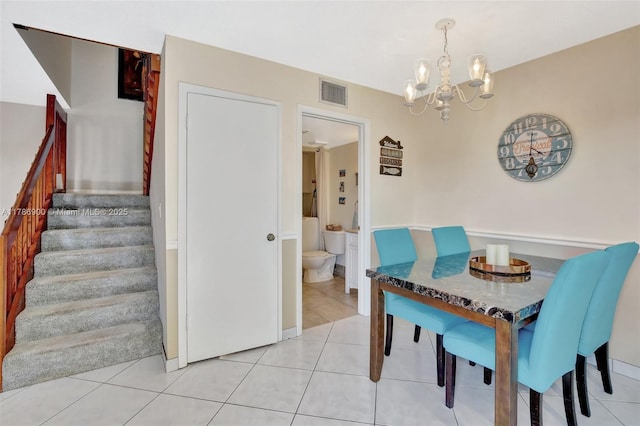11914 SW 12th Ct, Davie, FL 33325 - dining area featuring stairs, a chandelier, and light tile patterned floors